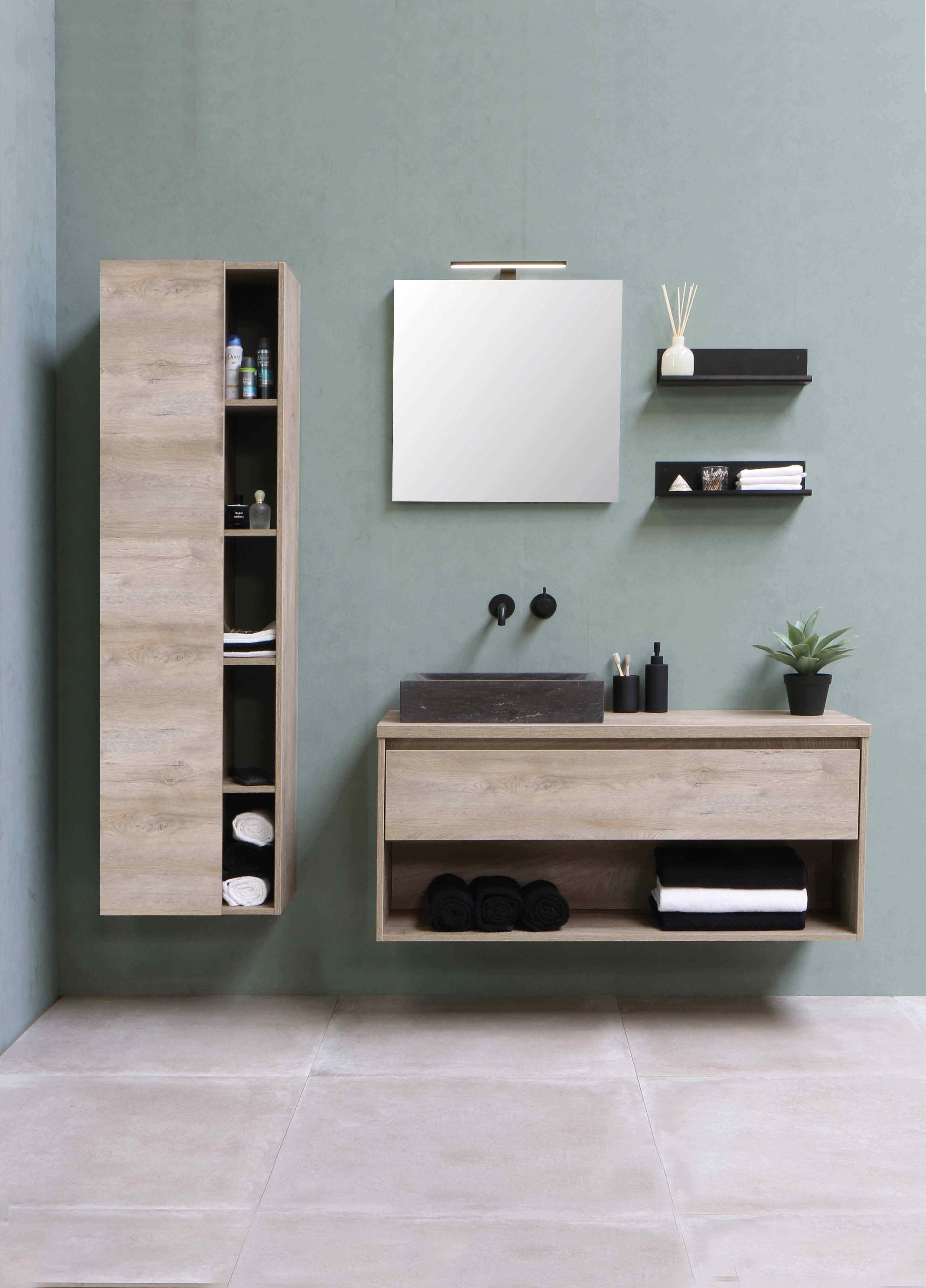 Mirror and wooden cabinet in cozy bathroom.