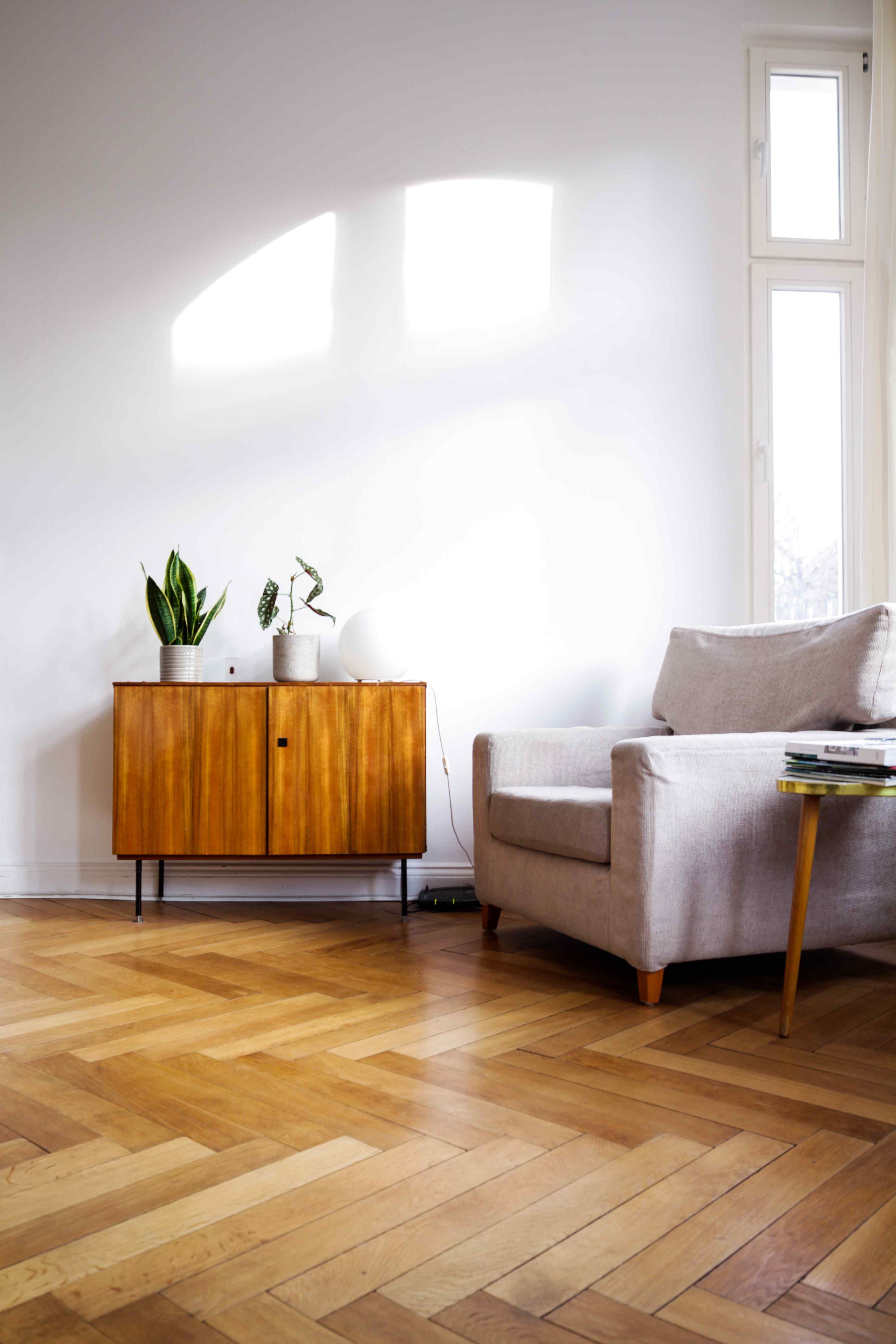 A well-furnished room showcasing a comfortable couch, an elegant table